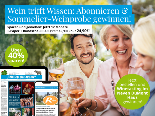 Menschen die gemeinsam an einem Tisch sitzen und Wein trinken und das KR E-Paper